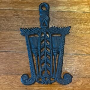 Vintage Cast iron witches trivet. Brooms rosemary heart and fiddle fern